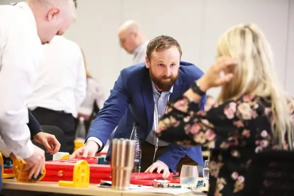 Participants reflecting on change management strategies during an MTa masterclass activity.